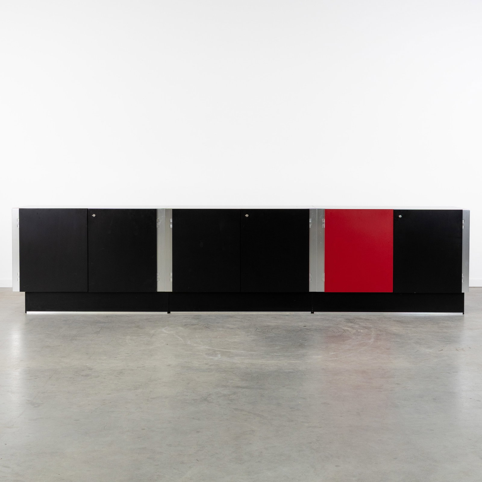 A Large designer sideboard with Red and Black cabinet doors, tinted glass and metal, circa 1960. (1 of 9)