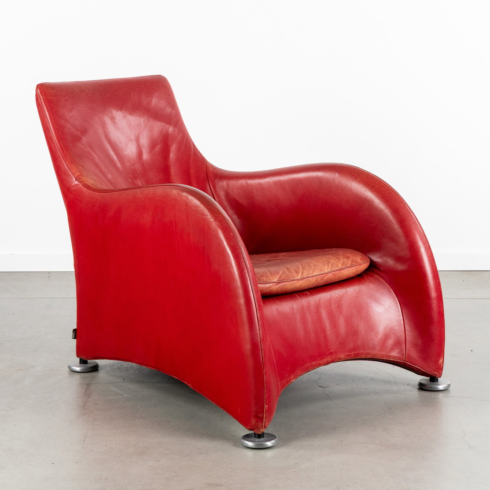 Gerard Van Den Berg (1947) 'Loge', a red leather armchair or lounge chair, for Montis, Netherlands, (1 of 8)
