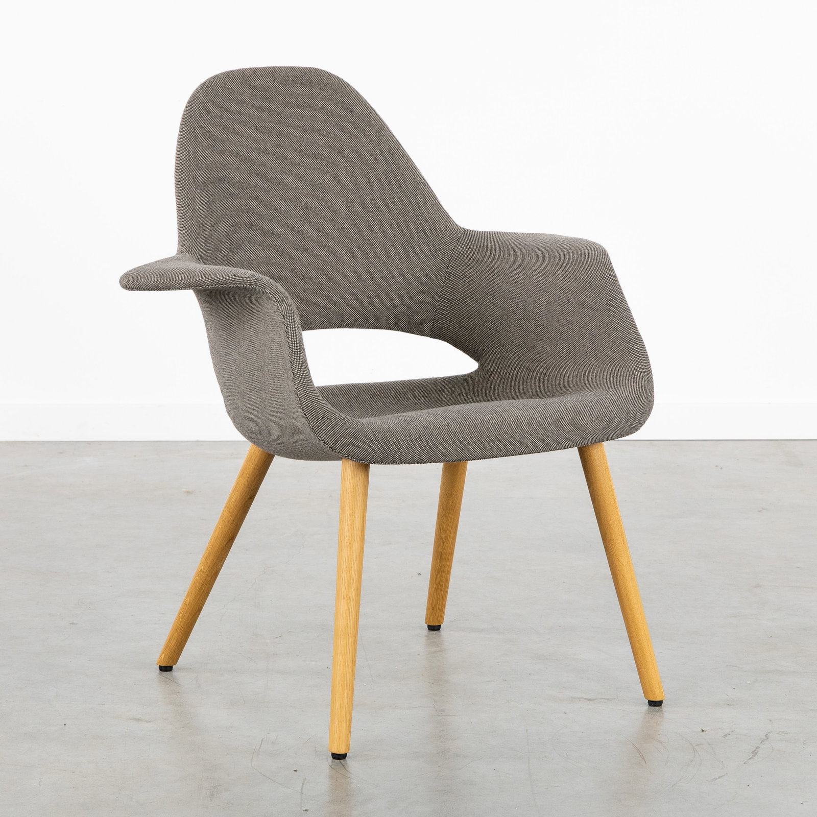 Charles Eames & Eero Saarinen (XX) 'Organic Chair', an armchair, for Vitra, Italy, circa 2010. (1 of 8)