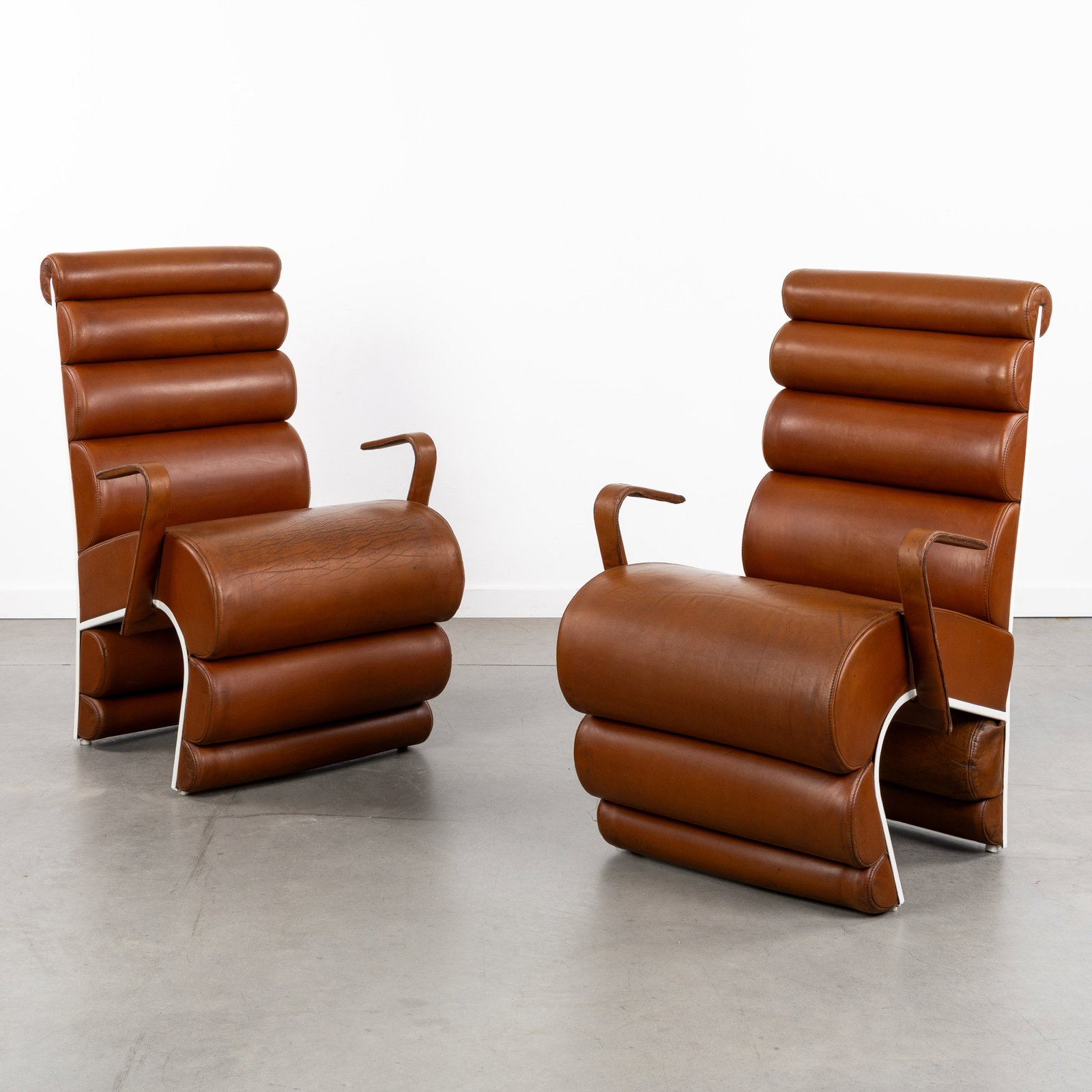 A Pair of decorative leather designer armchairs, leather and patinated metal, circa 1970. (1 of 11)