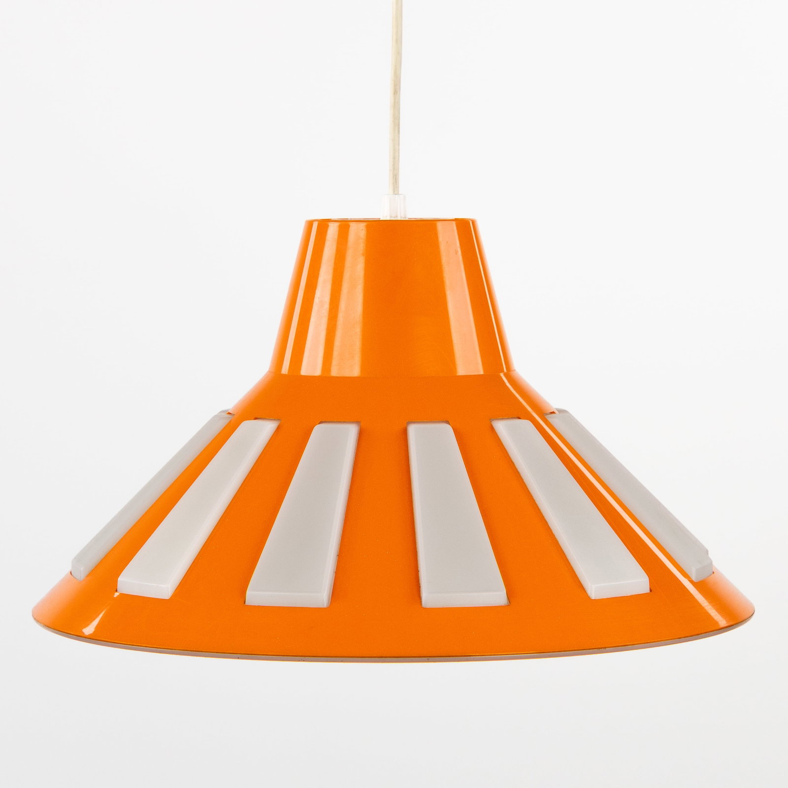 A Space Age 'UFO' pendant lamp, for Massive, circa 1970.: A Space Age 'UFO' pendant lamp, for Massive, circa 1970. Orange and white plastic.Space Age, UFO model, for Massive.Labeled 'Massive'. Belgium, circa 1970.
