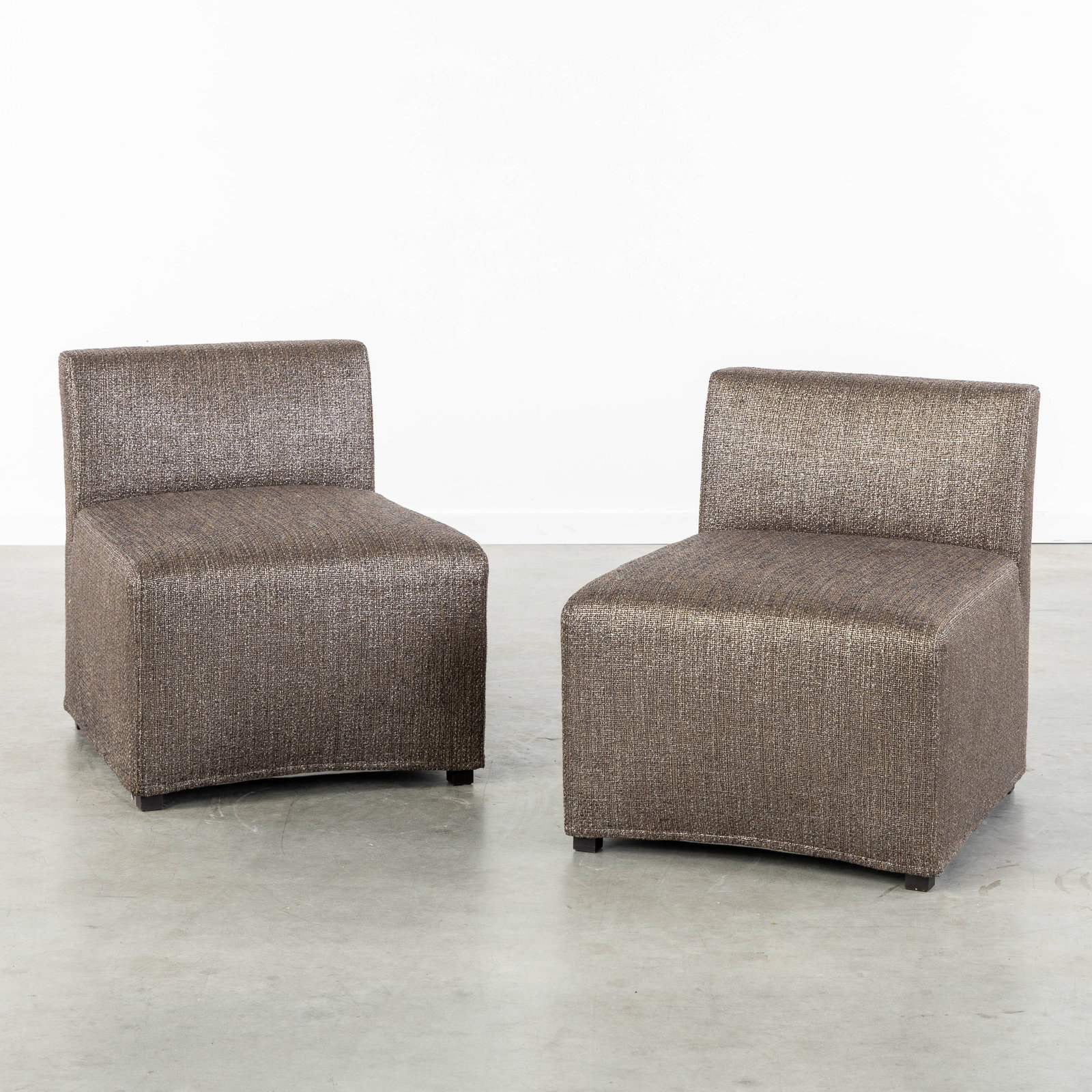Andrea Parisio (1964) a pair of club chairs, for Meridiani, Italy.: Andrea Parisio (1964) a pair of club chairs, for Meridiani, Italy. Wooden frame and upholstery.Design by Andrea Parisio, for Meridiani, Italy.Marked for Meridiani on the bottom.