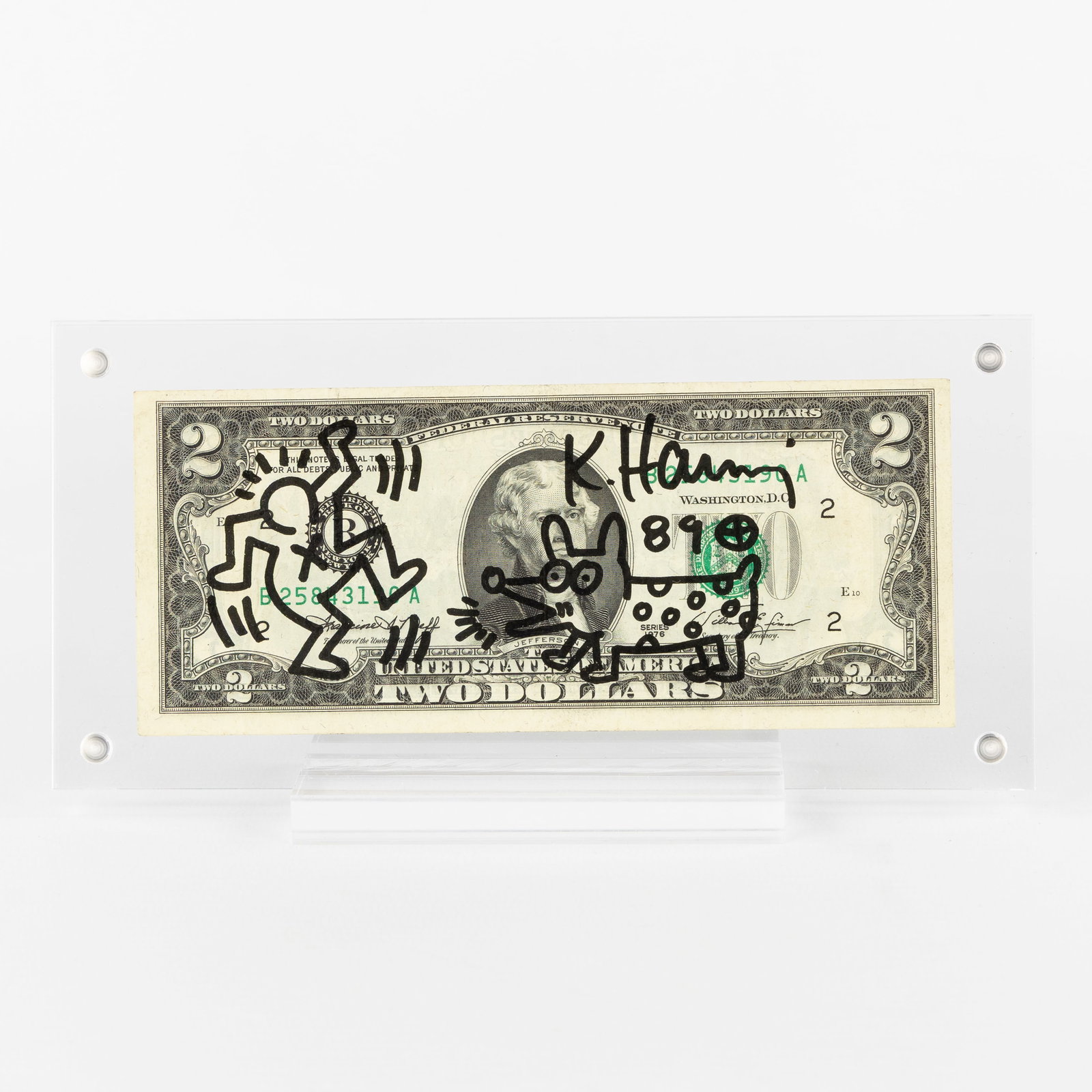 Keith Haring (1958-1990) (Attr.) 'Two Dollar', felt pen on a two-dollar bill (1989).: Keith Haring (1958-1990) (Attr.) 'Two Dollar', felt pen on a two-dollar bill (1989). Felt pen on a two-dollar bill.Signed and dated upper right. (9 x 18.8 cm) (15.7 x 6.7 x 0