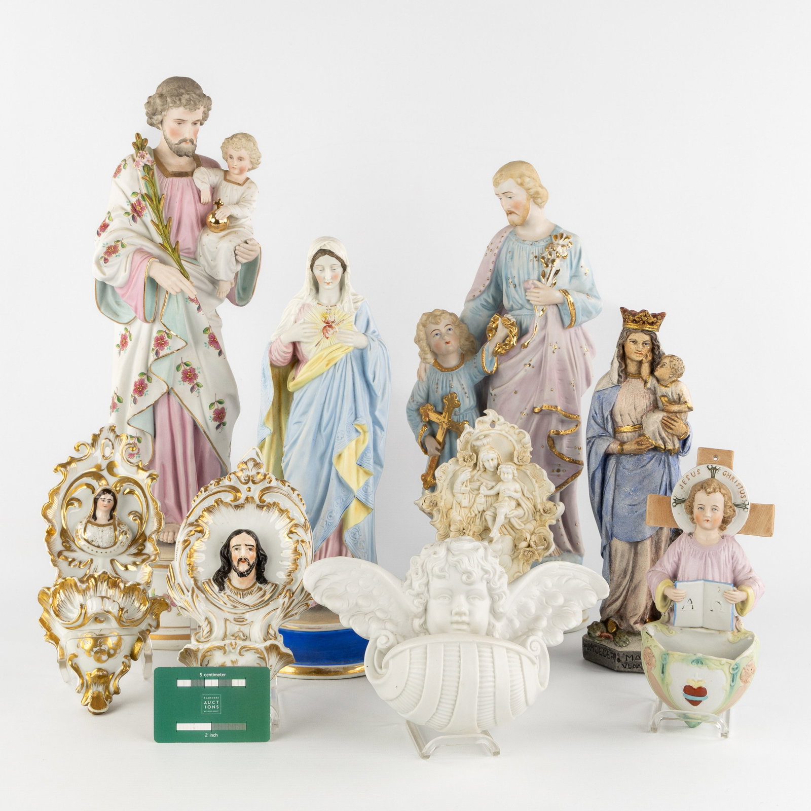 Four statues of saints and five holy water fonts, porcelain, biscuit porcelain, and stoneware. (1 of 6)