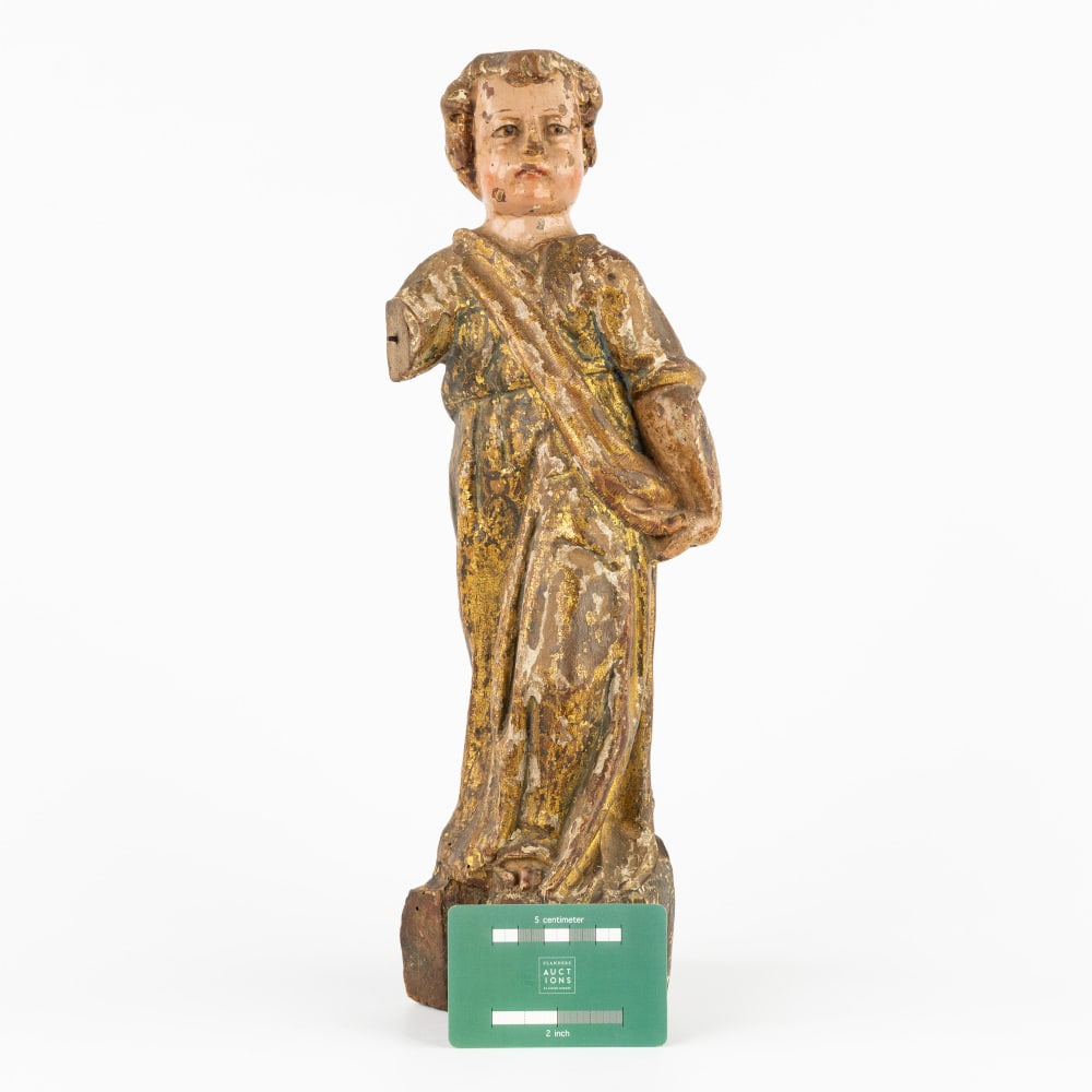 An Antique wooden sculpture of a ceroferial angel, carved and patinated wood. 17th/18th C. (1 of 6)