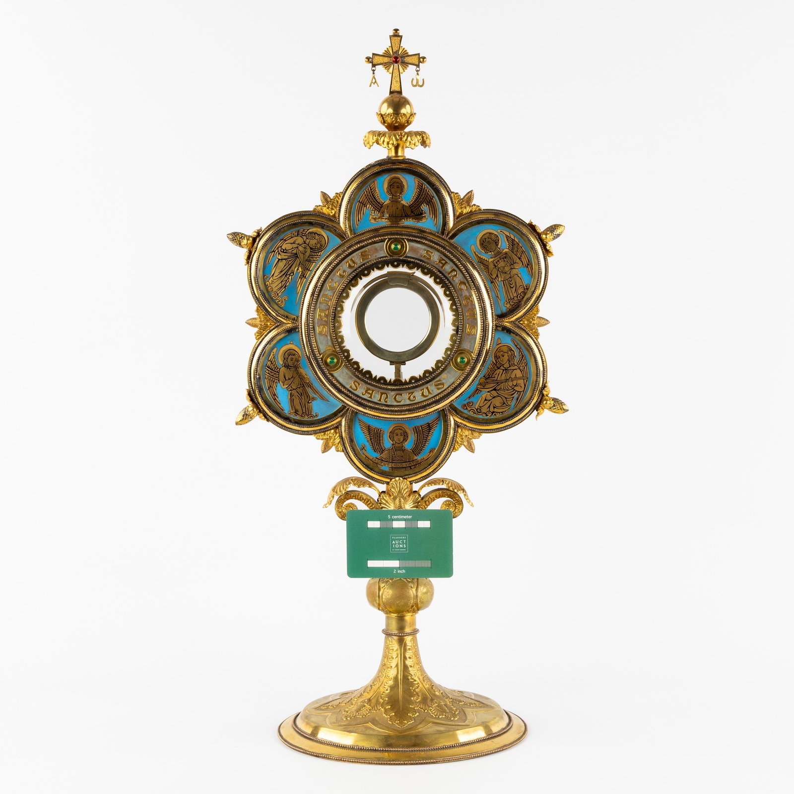 A Monstrance with Musical Angels, gilded metal and enamel, Gothic Revival.: A Monstrance with Musical Angels, gilded metal and enamel, Gothic Revival. Gilded metal and enamel. Monstrance, including lunula. Decorated with musical angels, Ecce Panis Angelorum, Factus Cibus Viat
