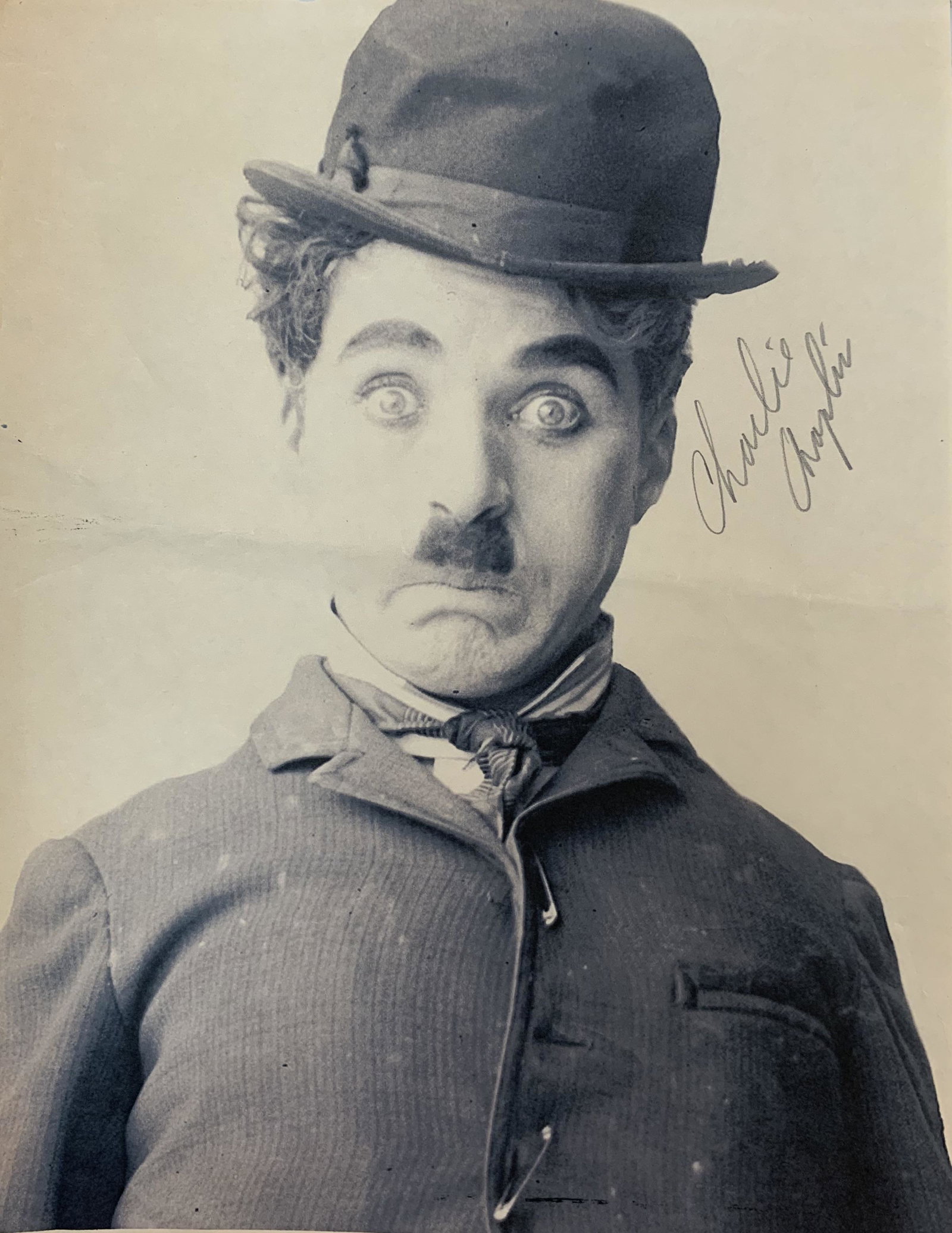 Charlie Chaplin Autographed Photo: Autographed Photo (8.5x11) COA provided through Auctions Xpress