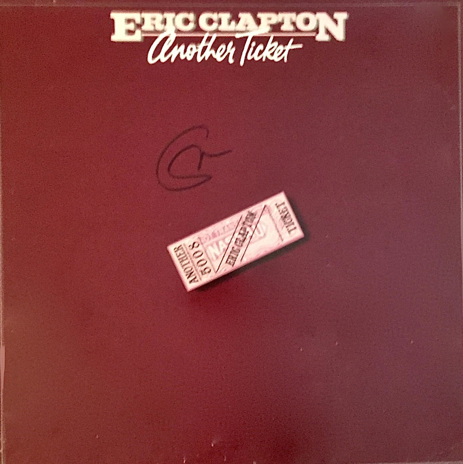 Eric Clapton Autographed Album: Signed vinyl record, COA provided by Auctions Xpress.