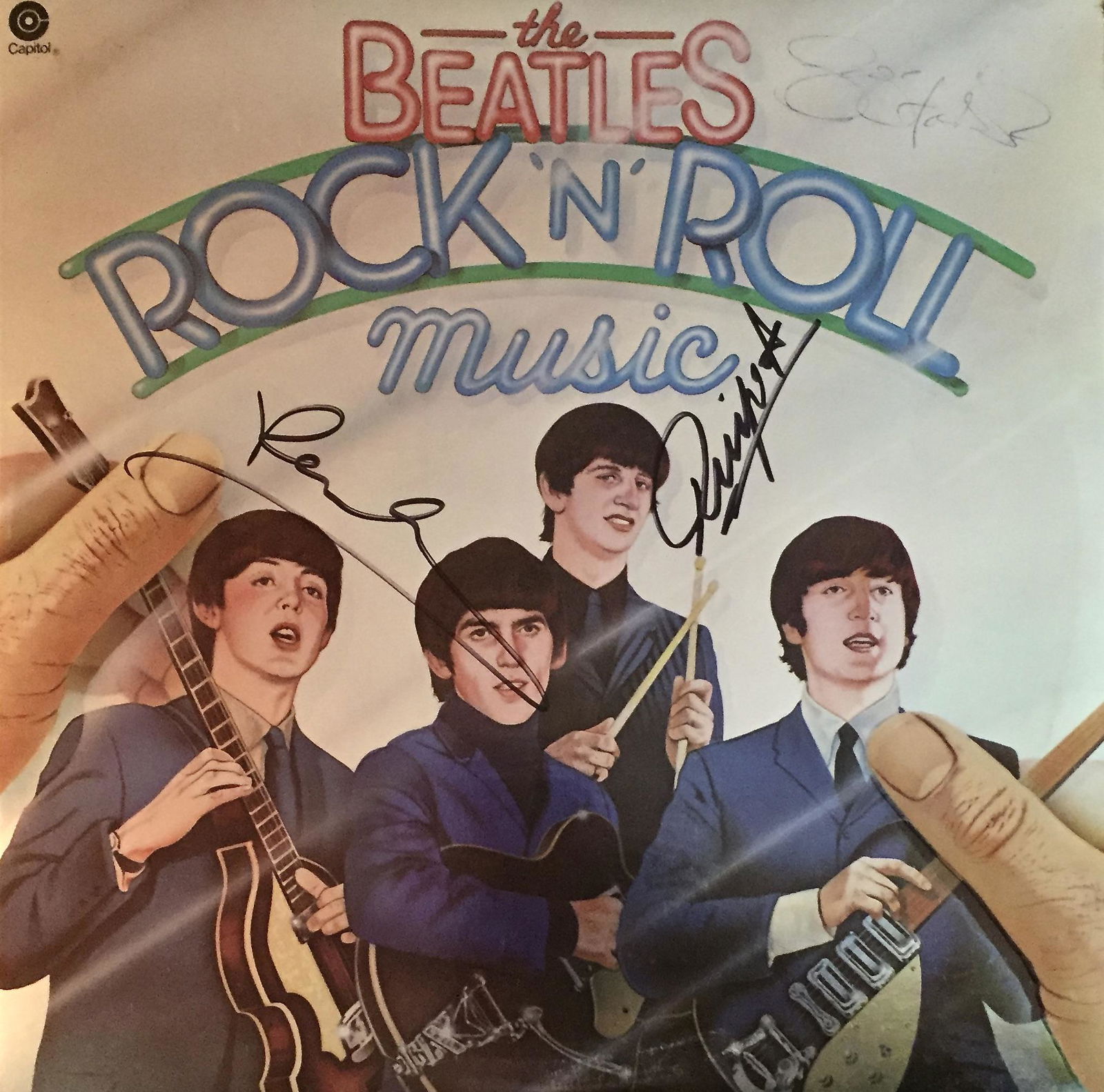 Beatles Album Autographed by John Lennon, Paul: Signed vinyl record, COA provided by Auctions Xpress.