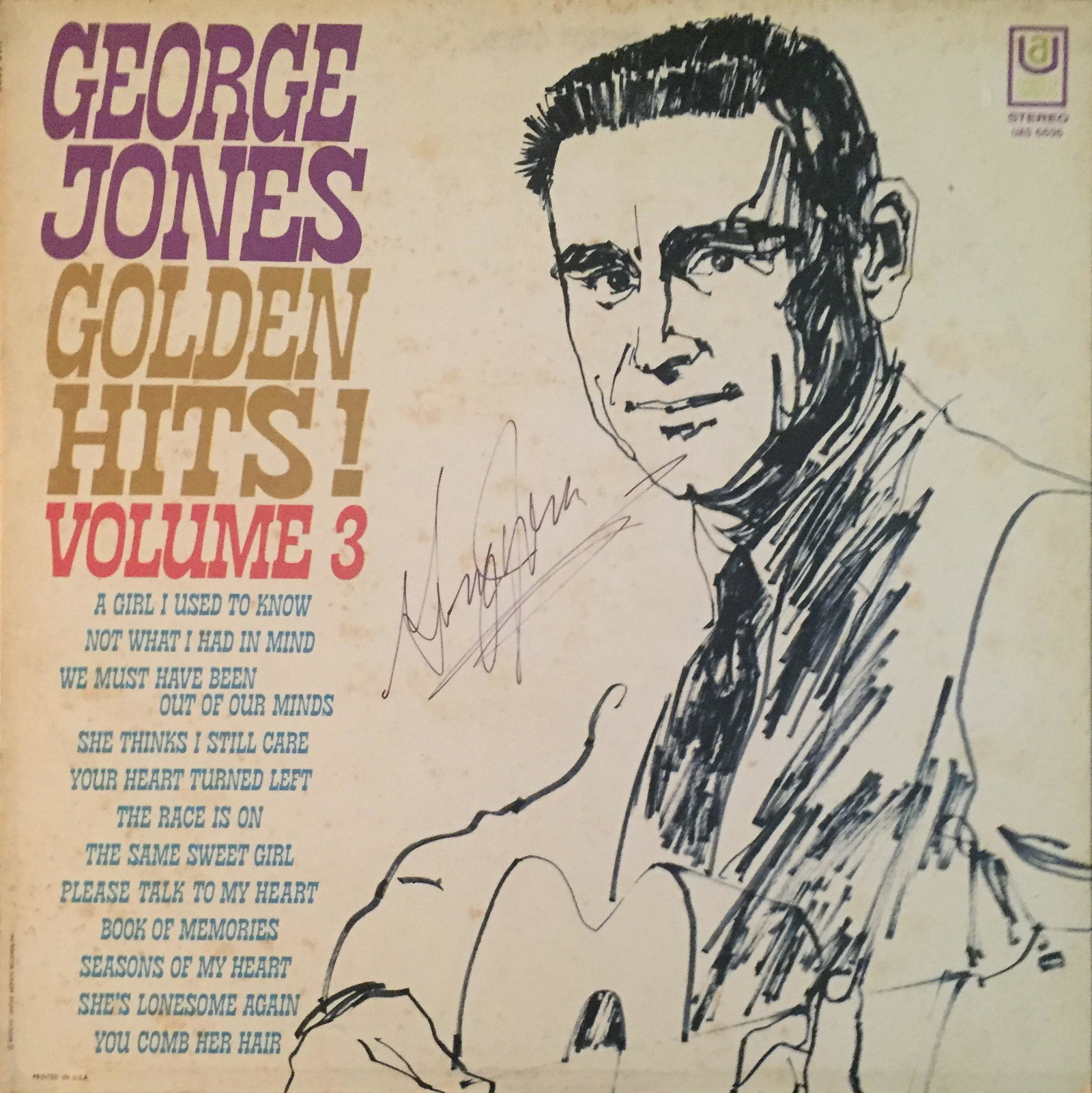 George Jones Autographed Album: Signed vinyl record, COA provided by Auctions Xpress.