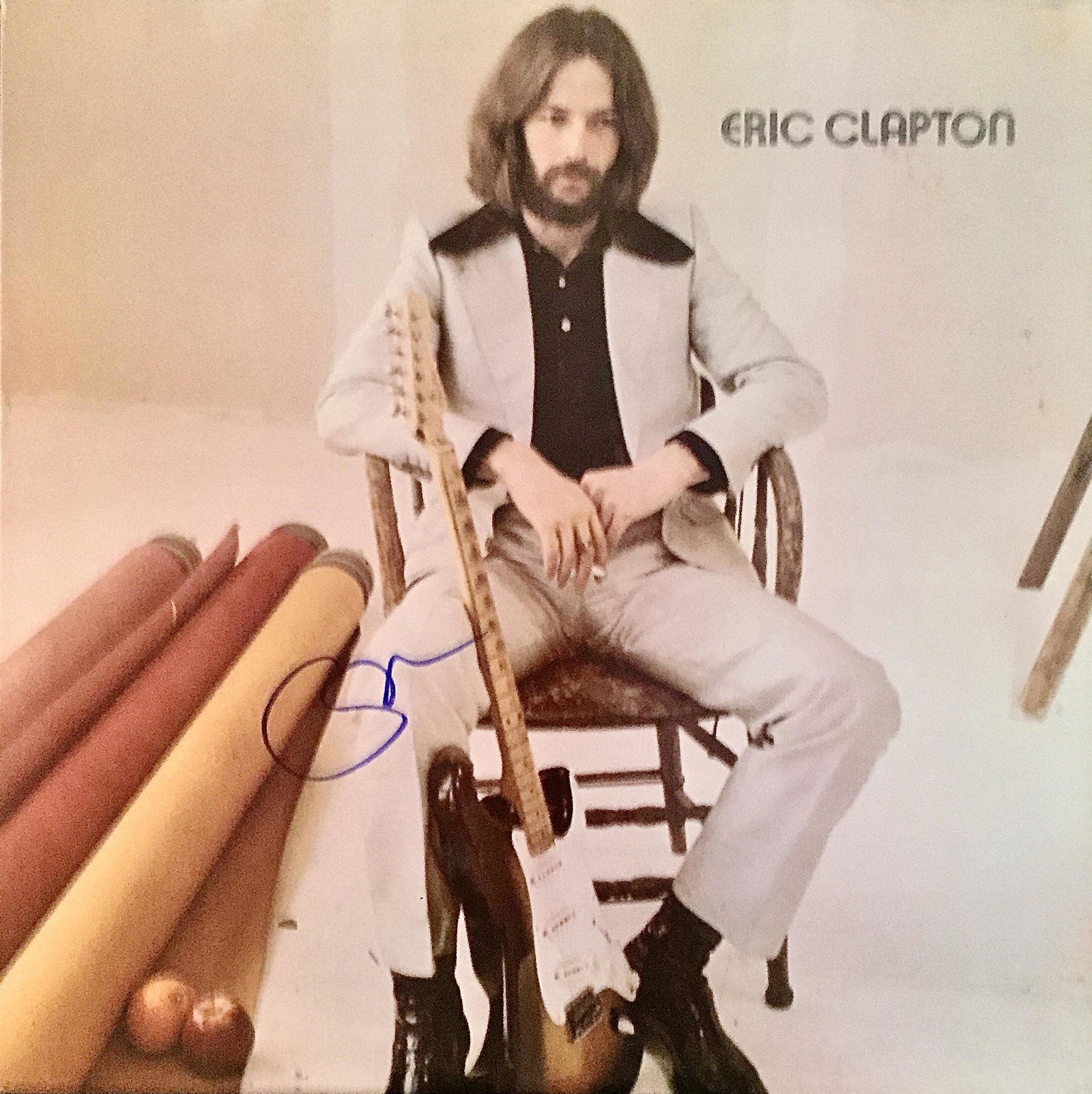 Eric Clapton Autographed Album: Signed vinyl record, COA provided by Auctions Xpress.
