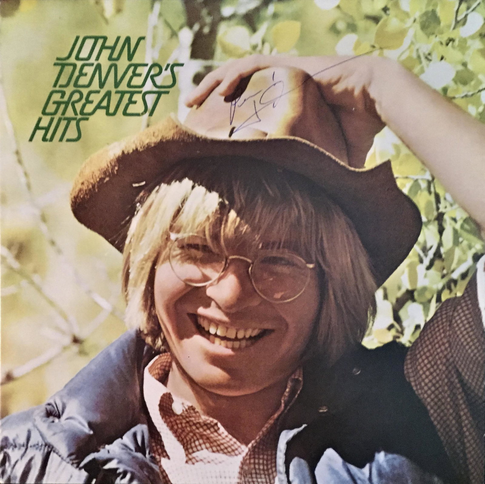 John Denver Autographed Album: Signed vinyl record, COA provided by Auctions Xpress.