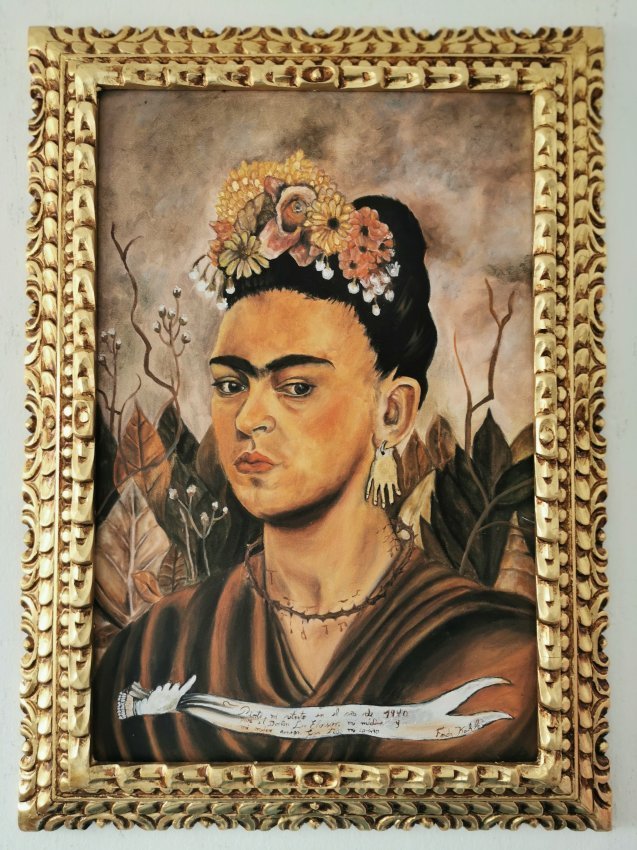 Frida Kahlo oil on canvas signed,sealed-in the style of: Frida Kahlo oil on canvas painting, Hand carved----------------Measures with frame: 21" x 29" inches aprox------------------------Frida Kahlo was a Mexican painter known for her many portraits, self-p
