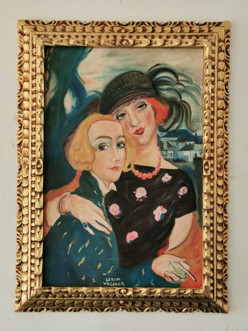 Gerda Wegener Oil on Canvas -In the Style of: In the style of Gerda Wegener Oil on Canvas painting-------------Measures with FRAME: 29" x 21" Inches aprox-----------------------Gerda Wegener grew up in Hobro and moved to Copenhagen as a teenager