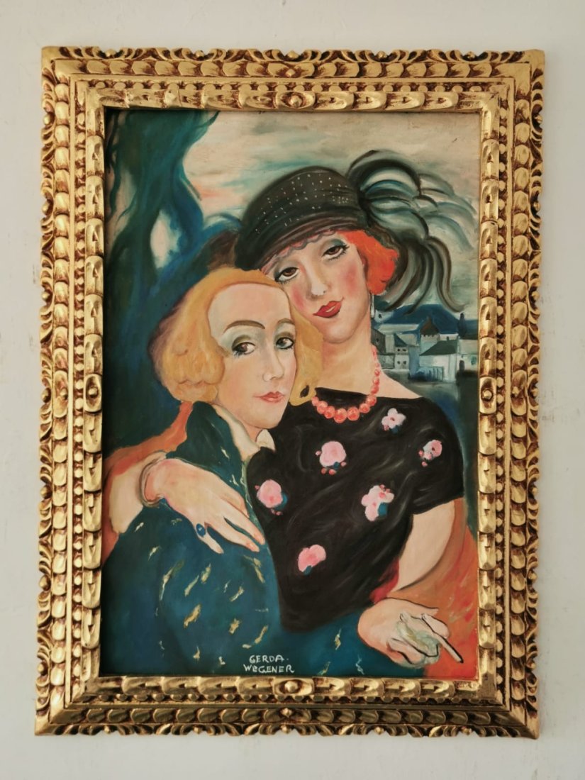 Gerda Wegener Oil on Canvas painting -In the Style of: In the style of Gerda Wegener Oil on Canvas painting-------------Measures with FRAME: 29" x 21" Inches aprox-----------------------Gerda Wegener grew up in Hobro and moved to Copenhagen as a teenager