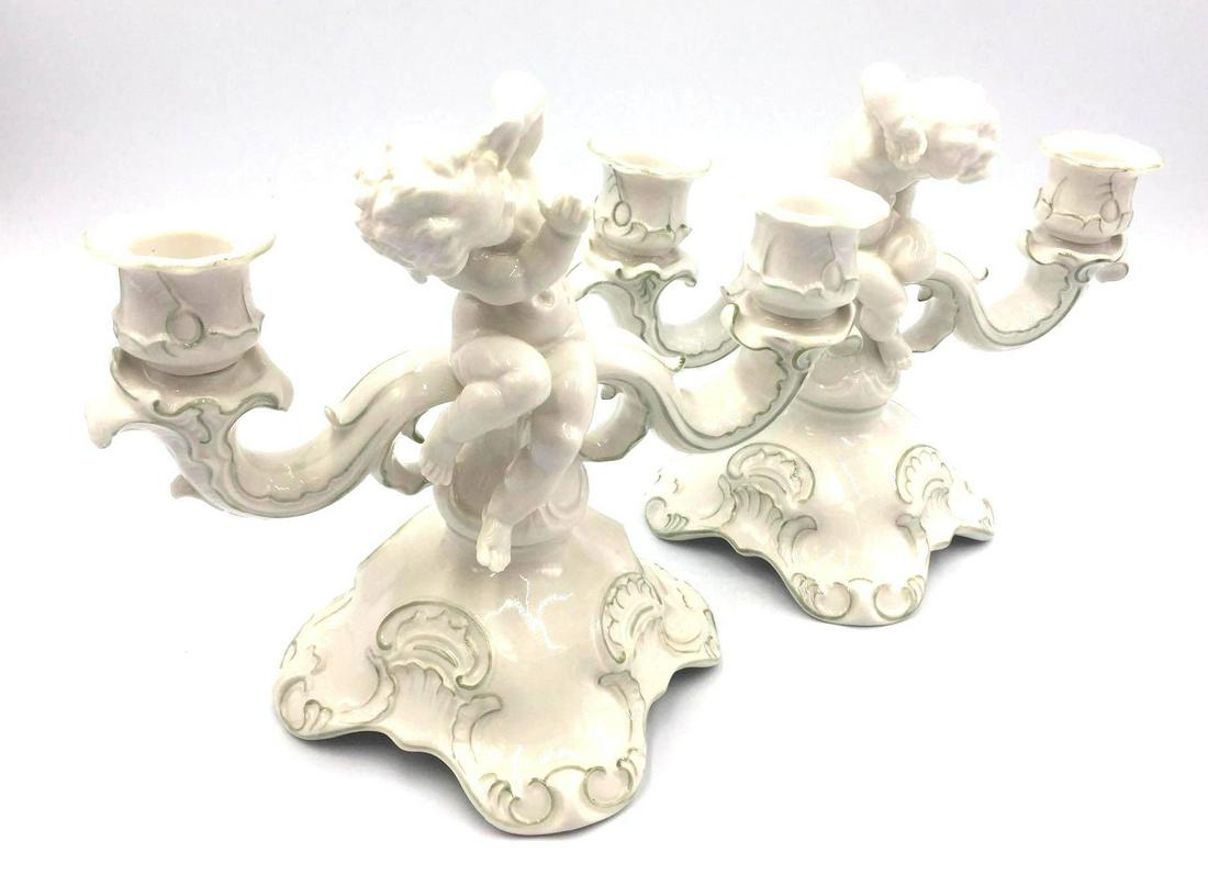 Pair Of German Hutschenreuther Porcelain Candelabras: Rare edition, Hutschenreuther Selb Germany Kunstabteilung (US Zone) porcelain candle holder antique set. c1930 K. Tutter Cherub.Very good used condition. Each holds two 1" taper candles. Green colored