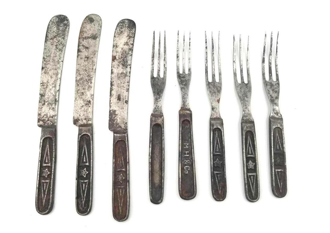 English M H & Co. 1850s Silverware 7 pc set: Antique 7 piece silverware set from M H & Co. Marked on fork handle. This set retains its metal shaping but has heavy rusting. Vintage condition. Weight: 14.66 oz