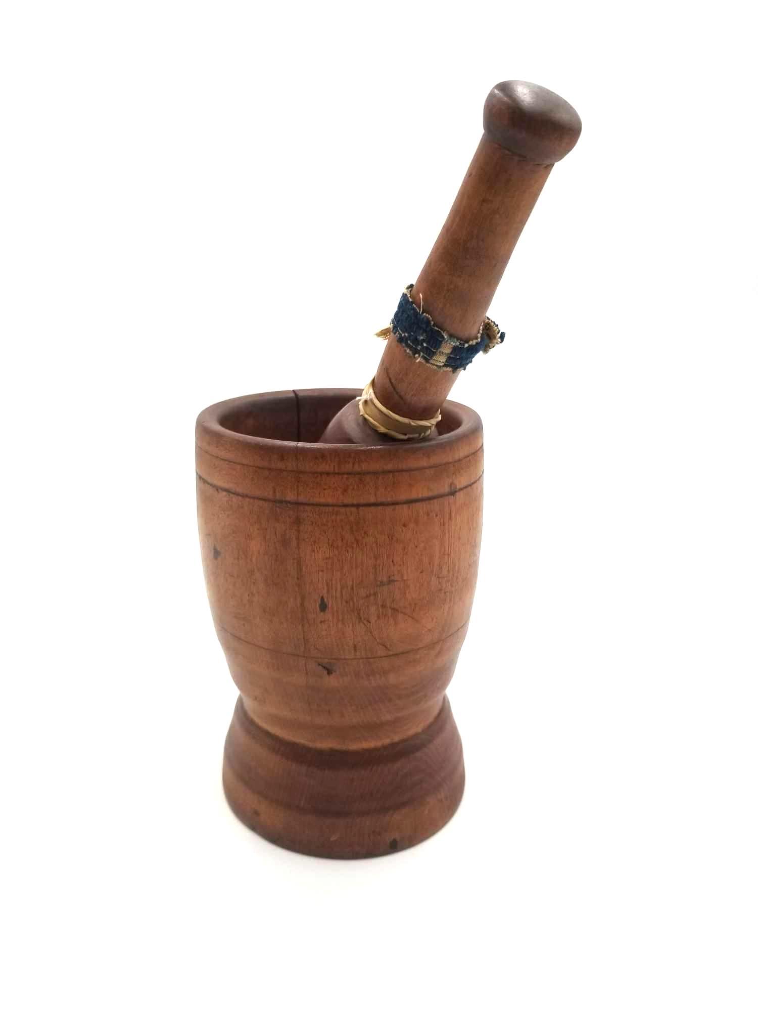 Large Antique Wood Mortar and Pestle: Medium colored brown mortar and pestle. Original finish, two clean cracks in wood, one 3 inches, one up the full length. Otherwise good condition. Width: 4.5 inches Length: 4.5 inches Height: 12 inche