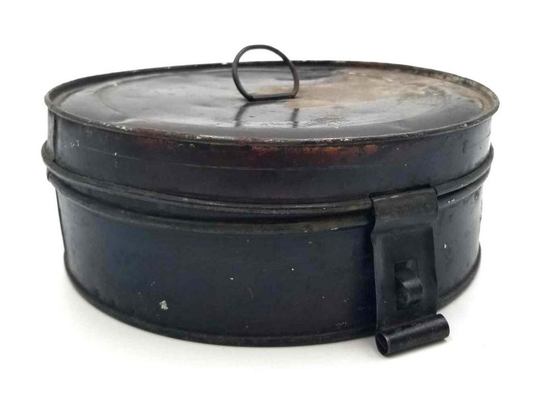Antique 1800's Spice Box & Tins: This antique round black tin canister spice chest is a rare find. The round tin chest has a carrying loop on top and a hinged latch in front. The inside has six spice canisters that fit nicely inside.