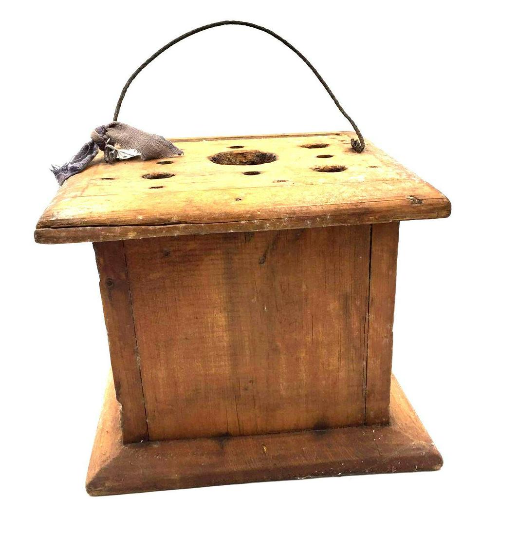 Vintage Wooden Foot warmer: This foot warmer is square and made out of wood and has a wire handle. Doesn't have the tin for coal. Perfect for decor or to add to your collection. This piece does have some splits in the wood wear