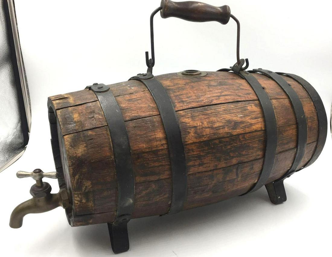 Civil War Field Ambulance Water Keg: Civil War Field Ambulance Water Keg. A Standard Equipment Aboard Union Army Civil War Field Ambulance Wagons. Includes 5 of the 6 blackened metal bands and a brass spigot and filler at the top. The Wo