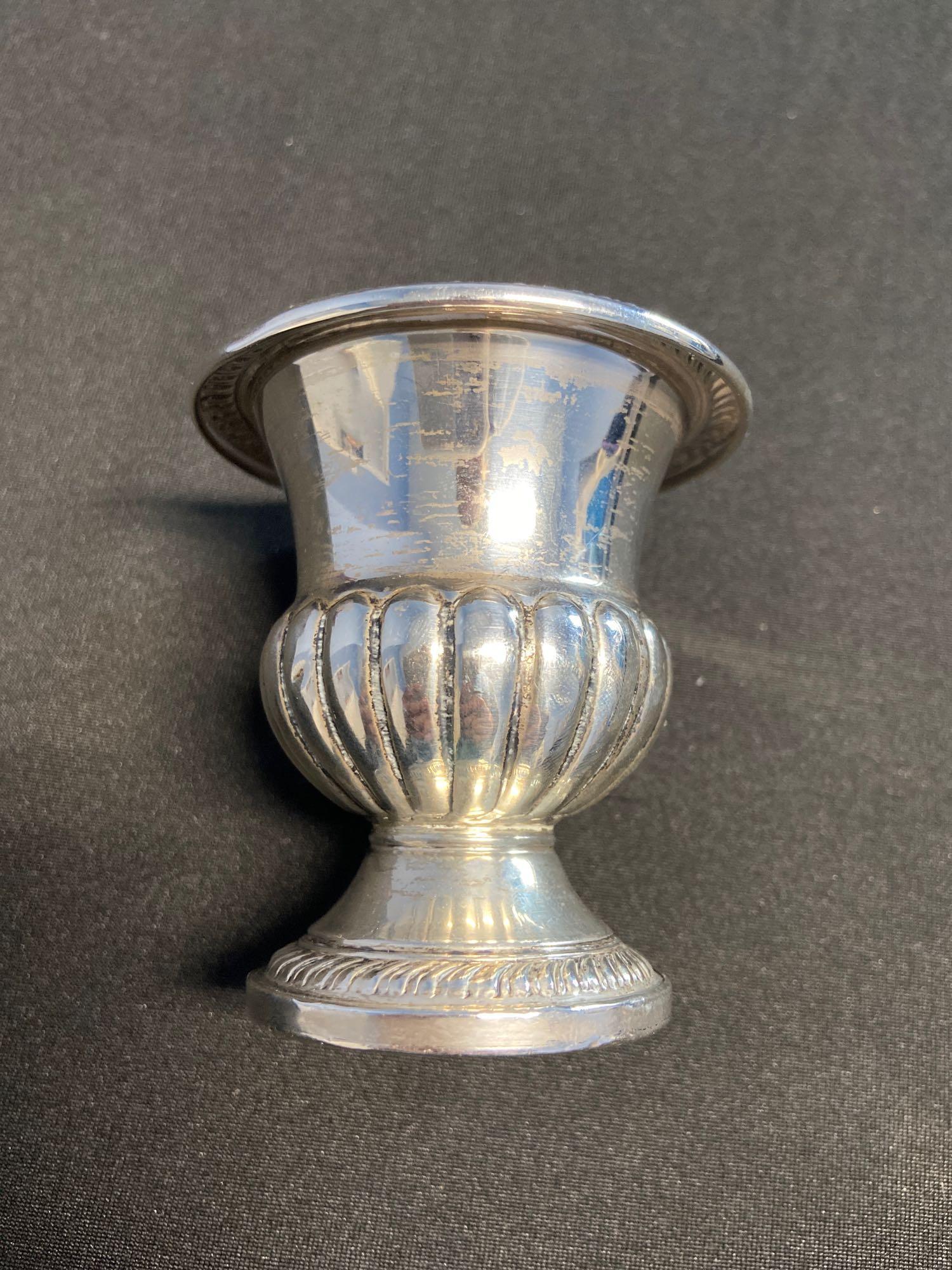 Hamilton Sterling Weighted Tooth pick holder: Hamilton Sterling Weighted Tooth pick holder. Approximately 2.5 inches by 2.5 inches. Please see pictures for any stamped hallmarks or other marking.