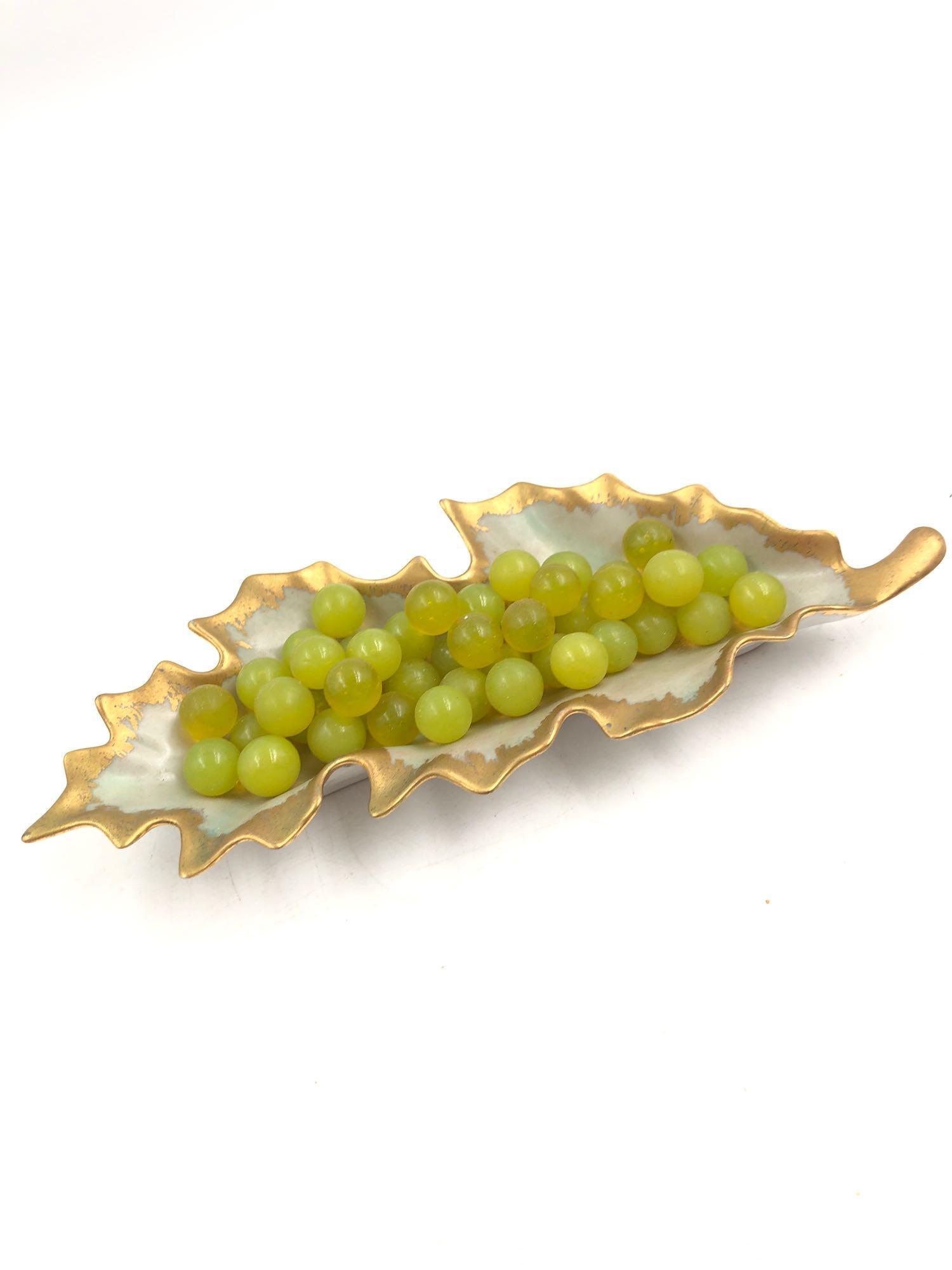 45 Uranium Glass Marbles: 45 Uranium Glass Marbles 45 light green marbles glow under UV light- indicating the presence of uranium in the glass.