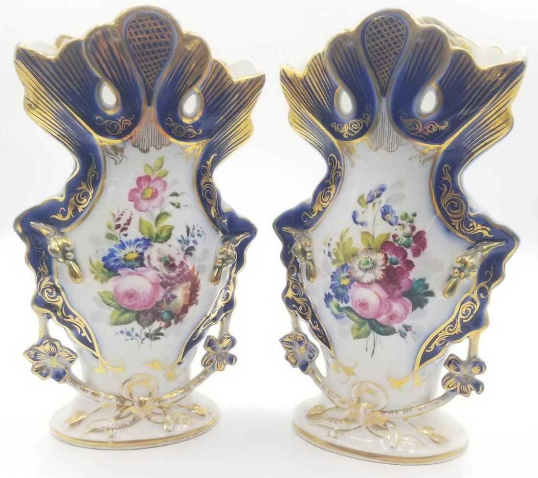 Pair of Porcelain Gold and Blue Colored Vases: Pair of Porcelain Gold and Blue Colored Vases. Gold and blue colored vases, made of porcelain and in decent condition. Height is 10.7 inches and bottom diameter is 4.4 inches.