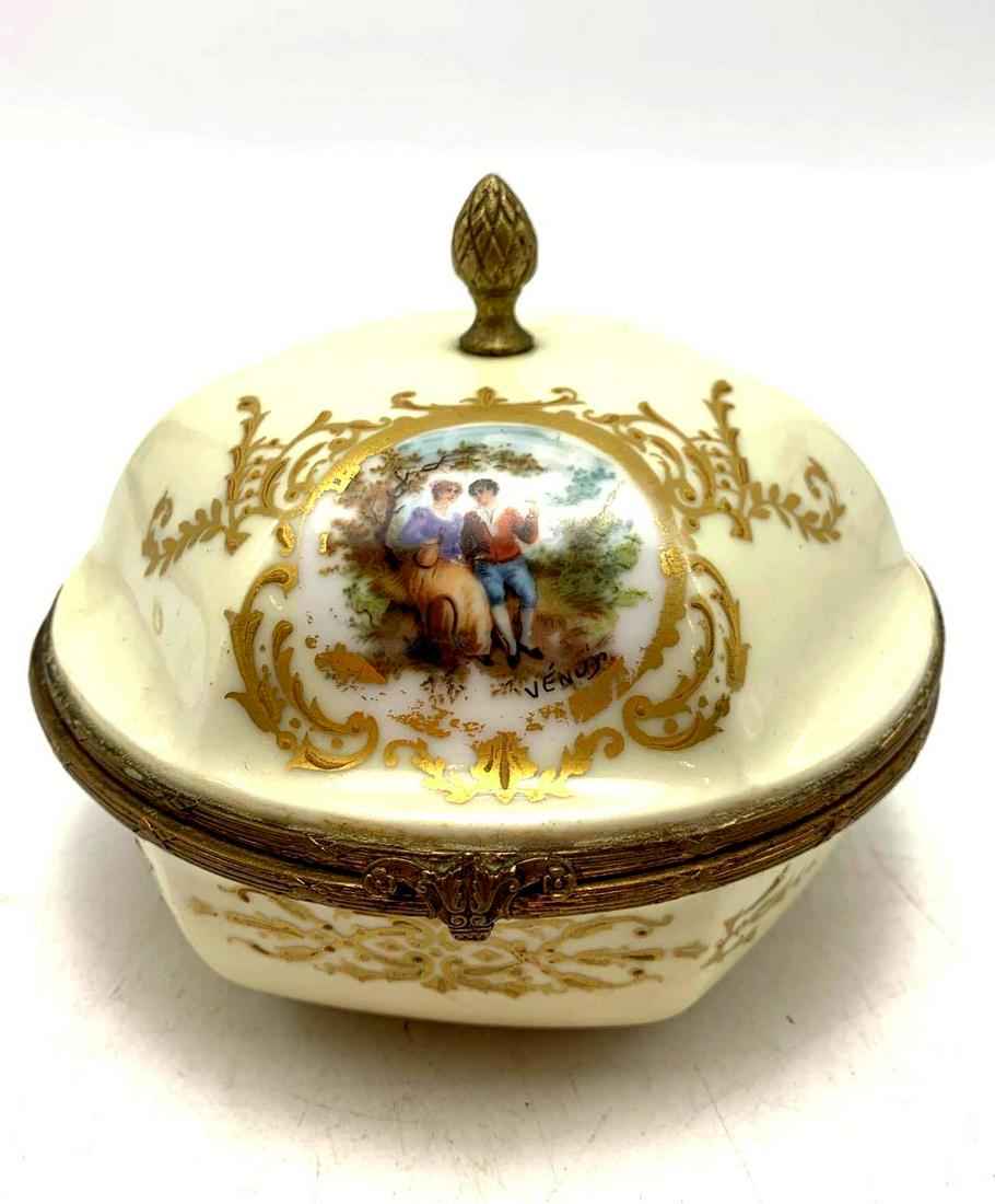 French Dresser Box: French Dresser Box Porcelain French hand painted Dresser Box. Stamped "France" on the bottom and has brass fittings. Measures 4 1/2 inches tall, 5 1/8 inches wide, and 2 inches deep.