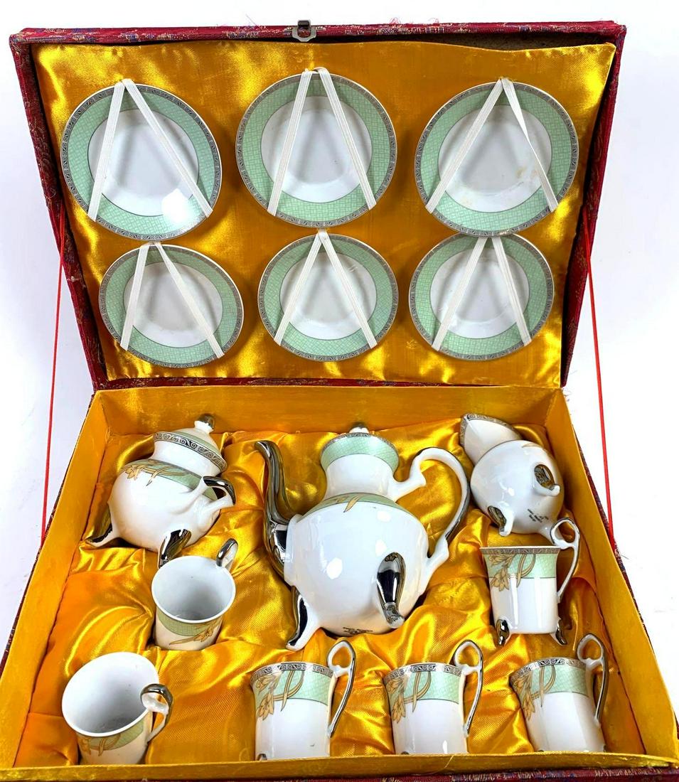 Porcelain Tea Set: Porcelain Tea Set15 Piece porcelain Tea Set with a Czech Republic design.5.5"Hx15 1/4Lx 11"D