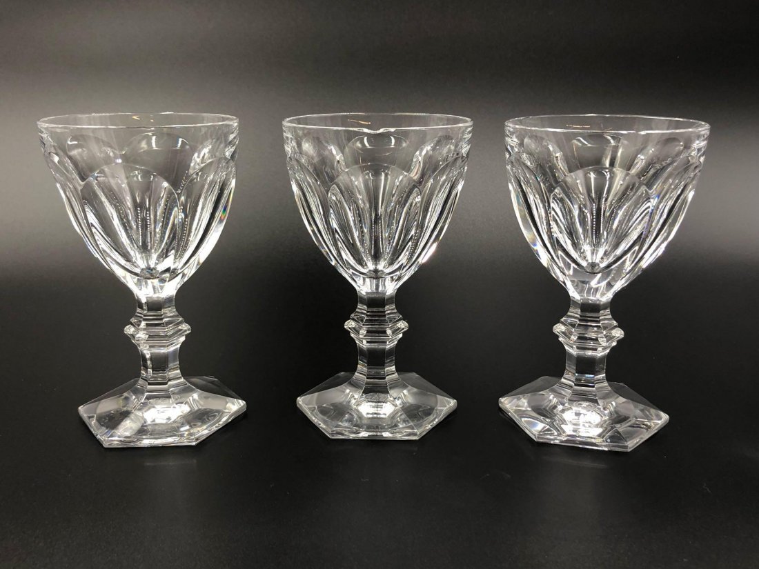 3 Baccarat Harcourt Red Wine Glasses: Set of 3 Harcourt 1841 style Baccarat red wine glasses measuring 5.3 inches tall. Glasses are marked on the bottom "Baccarat FRANCE". Two glasses have a small chip in their rim and one has some residu