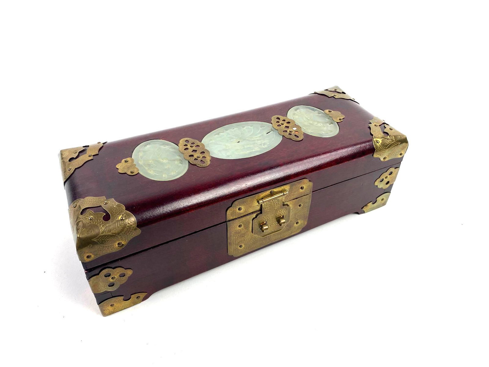 Rosewood Jewelry Box with Soapstone Carvings: Chinese jewelry box with brass hardware and inlaid soapstone carvings. 3in x 4in x 10in