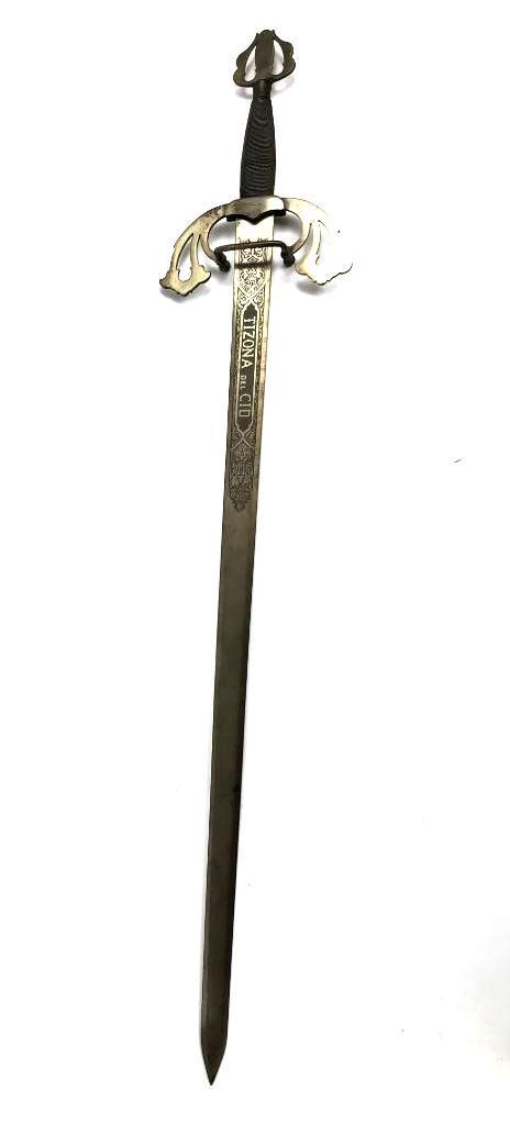 Tizona del Cid Sword: This sword is a reproduction of that of El Cid, a 12th Century Spanish knight. It was made by Marto of Toledo, as indicated by the etching at the base of the blade, and features intricate etchings inc