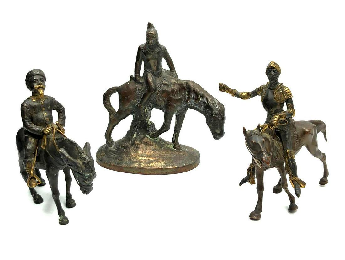 Lot of Bronze Soldier Figurines: Lot of Bronze Soldier Figurines This lot includes: -1 bronze figure of a Native American on a tired horse. Believed to be one out of a pair of bookends from The Last Trail collection. Item is 6 inches