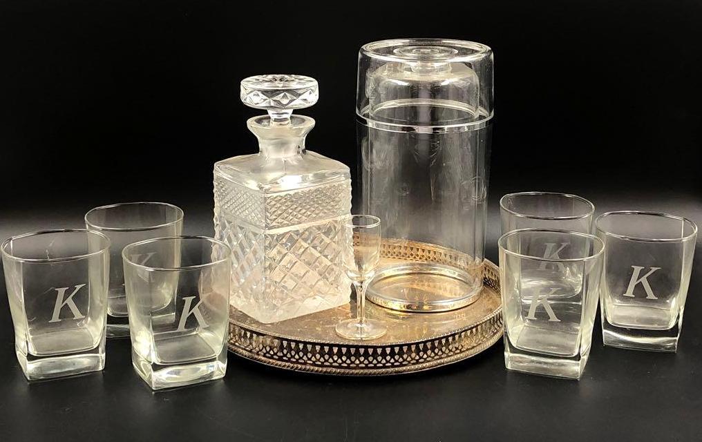 Items for Bar lot 2: Bar Set of Crystal Decanter, Wine Cooler, Rocks Glasses and Tray. Crystal decanter measures 8.5 inches tall and 4 inches wide. It has a chip in the rim. Glass cordial measures 4 inches tall with a bas
