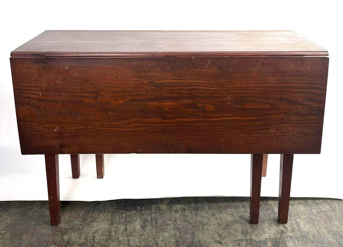 Drop Leaf Table: Drop leaf table. Measurements 45 X 29 X 16 inches when folded down. Each leaf measures to be 15.5 inches totaling 31 inches when completely opened.