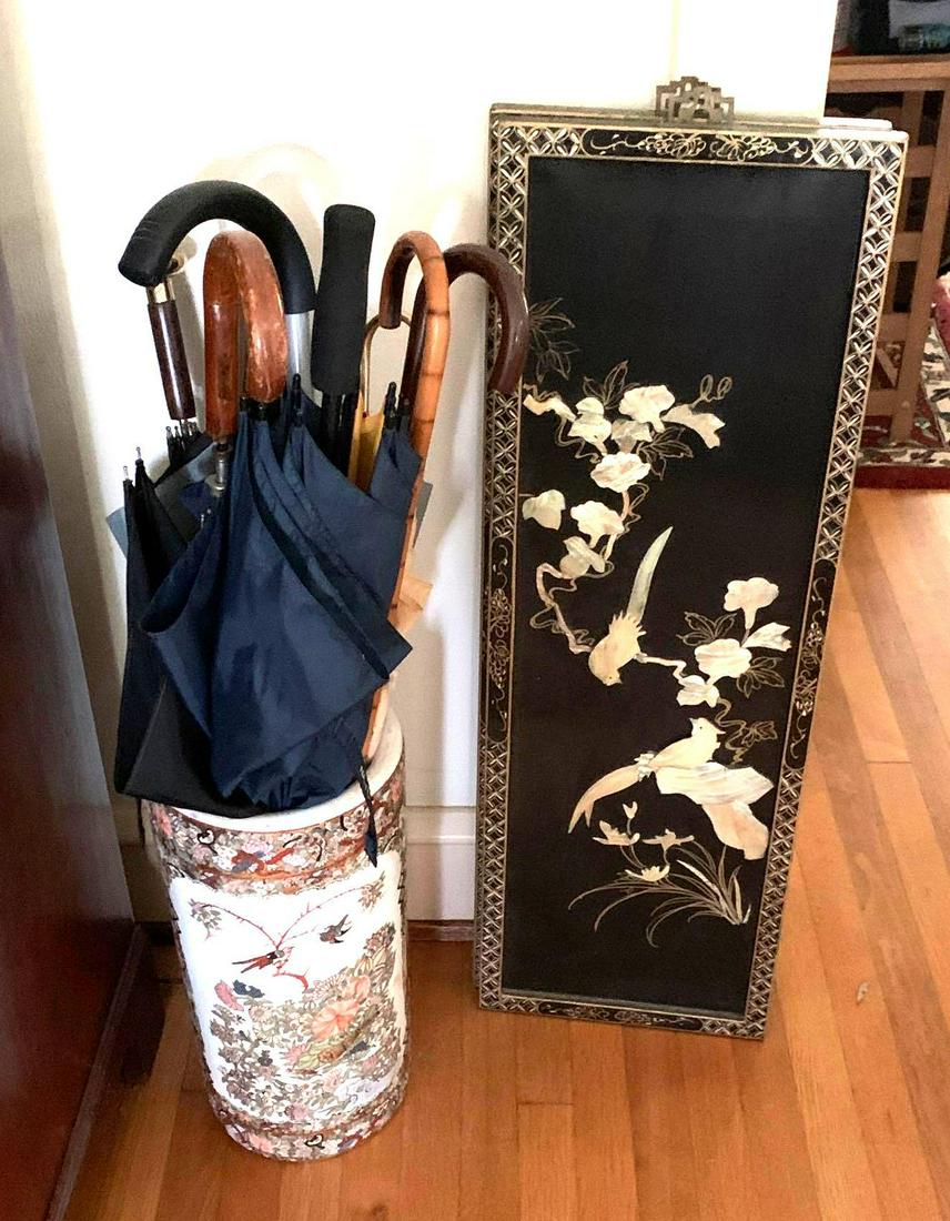 Porcelain Umbrella Caddy and More: This lot contains a porcelain umbrella caddy with umbrellas, a small runner rug, and a pair of Asian wall hangings with mother of Pearl.** Notice: This lot is located, in Hampton, Virginia. It require