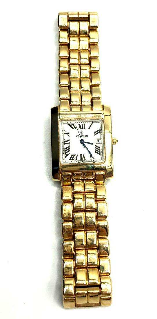 Authentic Concord 14kt Yellow Gold Watch: Concord 14kt Yellow gold ank style watch with an off white Roman numeral dial and fixed yellow gold bezel. Numbers on the back read 28-57-65 and 126937. Watch has been inspected by a jeweler and verif