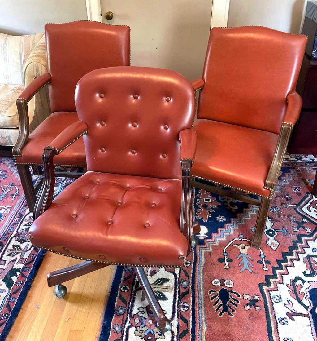Set of 3 Leather Chairs: 1 Rolling Chair and 2 Arm Chairs. Tag on the bottom states ?Genuine Leather by Classic? Chairs measure 22 inches long, 25 inches wide, and 38 inches tall. ** Notice: This lot is located, in Hampton, V