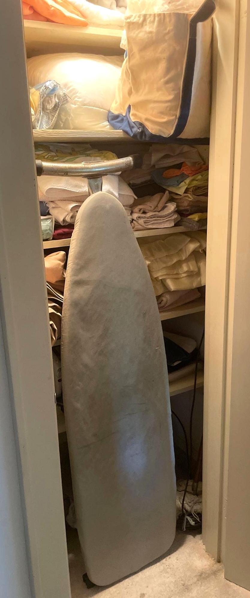 Contents of Linen Closet: Lot includes: assorted linens, blankets, towels, ironing board, iron, steamer, and more ** Notice: This lot is located, in Hampton, Virginia. It requires pickup, in Hampton - only on June 13th and 14t