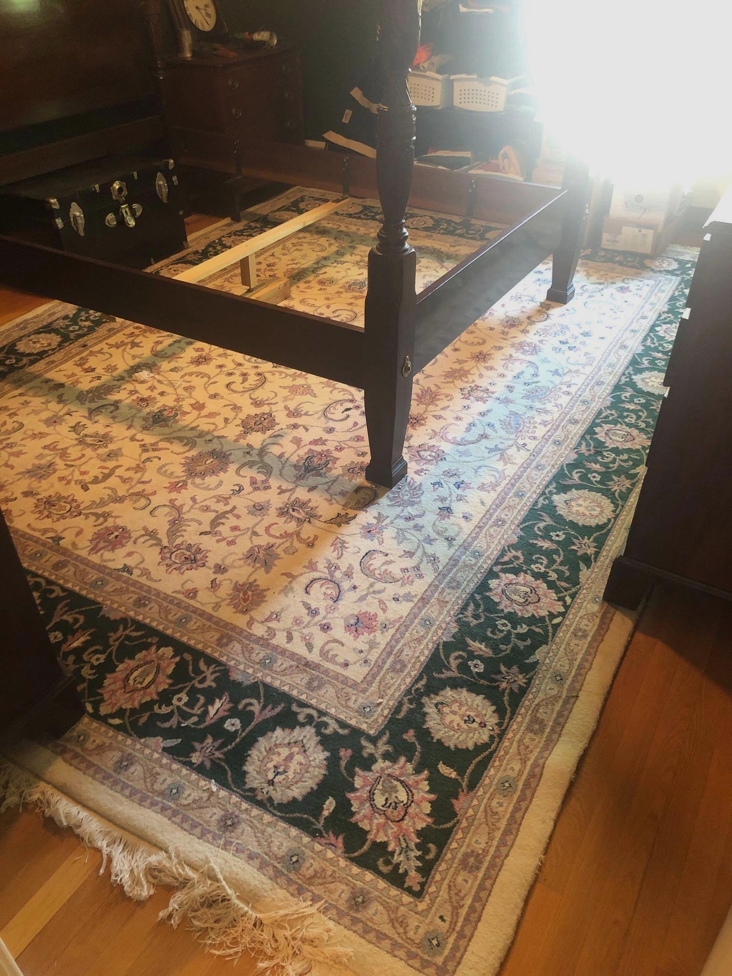 Large Green Pink and Beige Floor Rug: Large floral area rug measures 152 inches long by 108 inches wide and appears to be hand knotted. ** Notice: This lot is located, in Hampton, Virginia. It requires pickup, in Hampton - only on June 13
