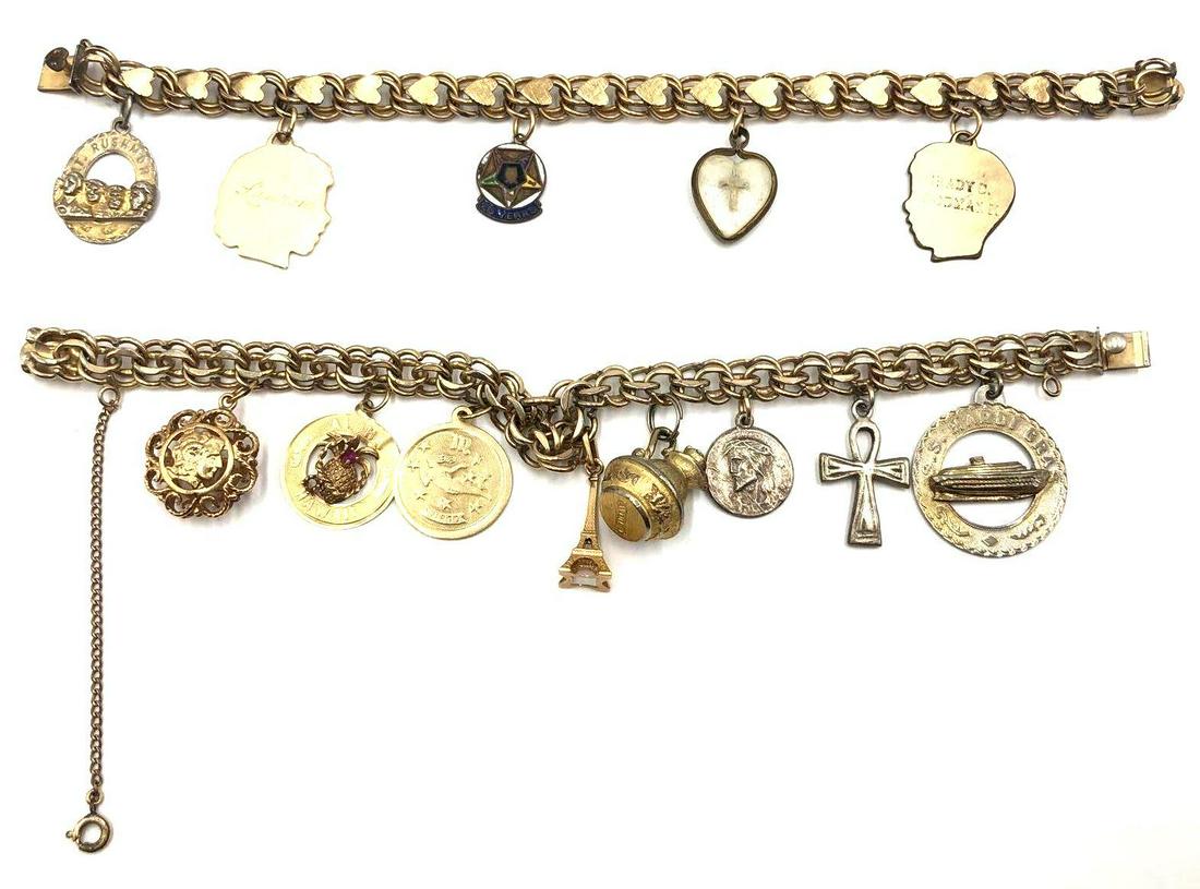 Charm Bracelets with Sterling Silver and 14kt Charms: Two charm bracelets- one with hearts features a few 14 karat gold charms and is marked 1/20 12 karat GF. The other bracelet is stamped 12kt GF and also features a few sterling silver and 14kt gold cha