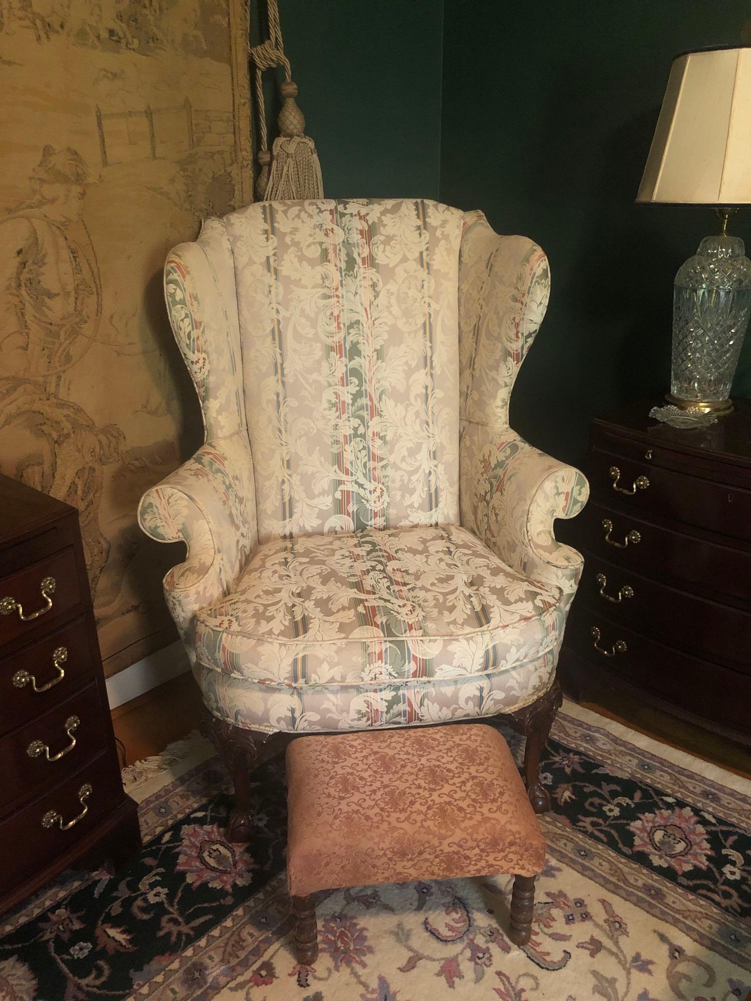 Floral Wing back Arm Chair: Wingback armchair with ornate carved legs and ottoman measures 47 inches tall 33 inches wide and 25 inches deep. ** Notice: This lot is located, in Hampton, Virginia. It requires pickup, in Hampton - 