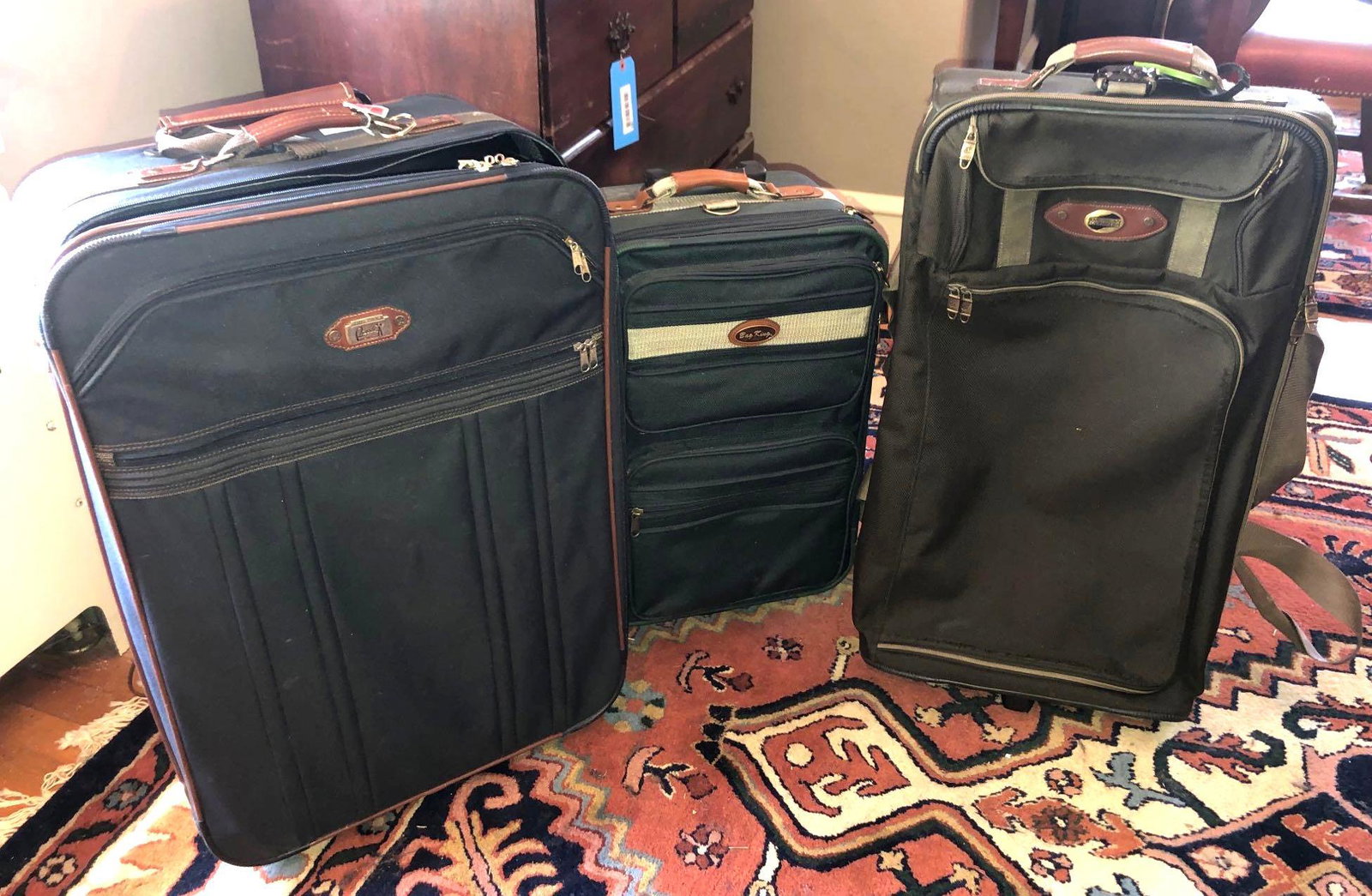 Lot of Luggage: Lot contains three large suitcases with various travel bags inside. ** Notice: This lot is located, in Hampton, Virginia. It requires pickup, in Hampton - only on June 13th and 14th, between 10-4pm. S