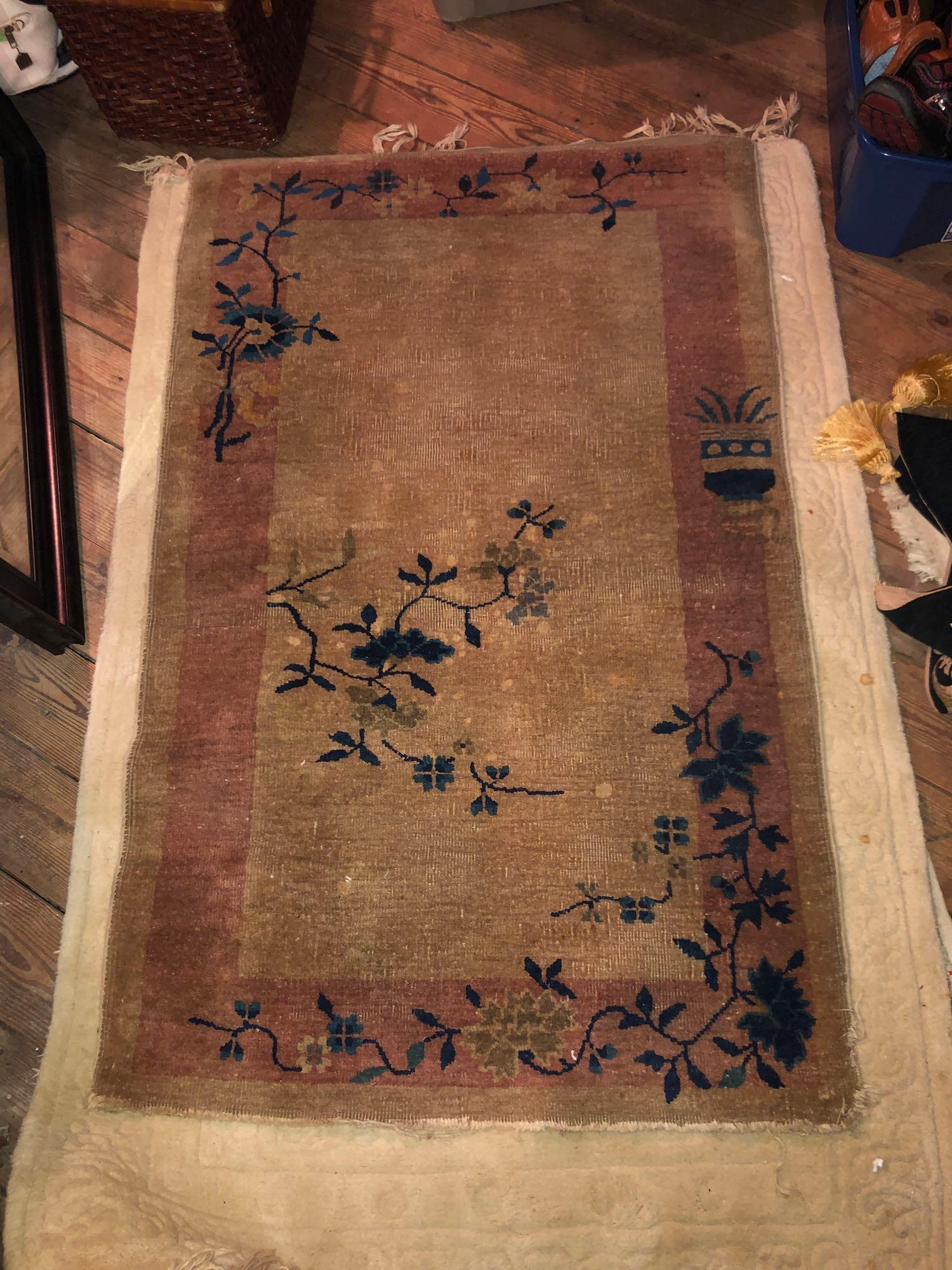 Pink and Tan Area Rug: pink and tan area rug with floral accents measures 36 inches wide and 57 inches long. ** Notice: This lot is located, in Hampton, Virginia. It requires pickup, in Hampton - only on June 13th and 14th,