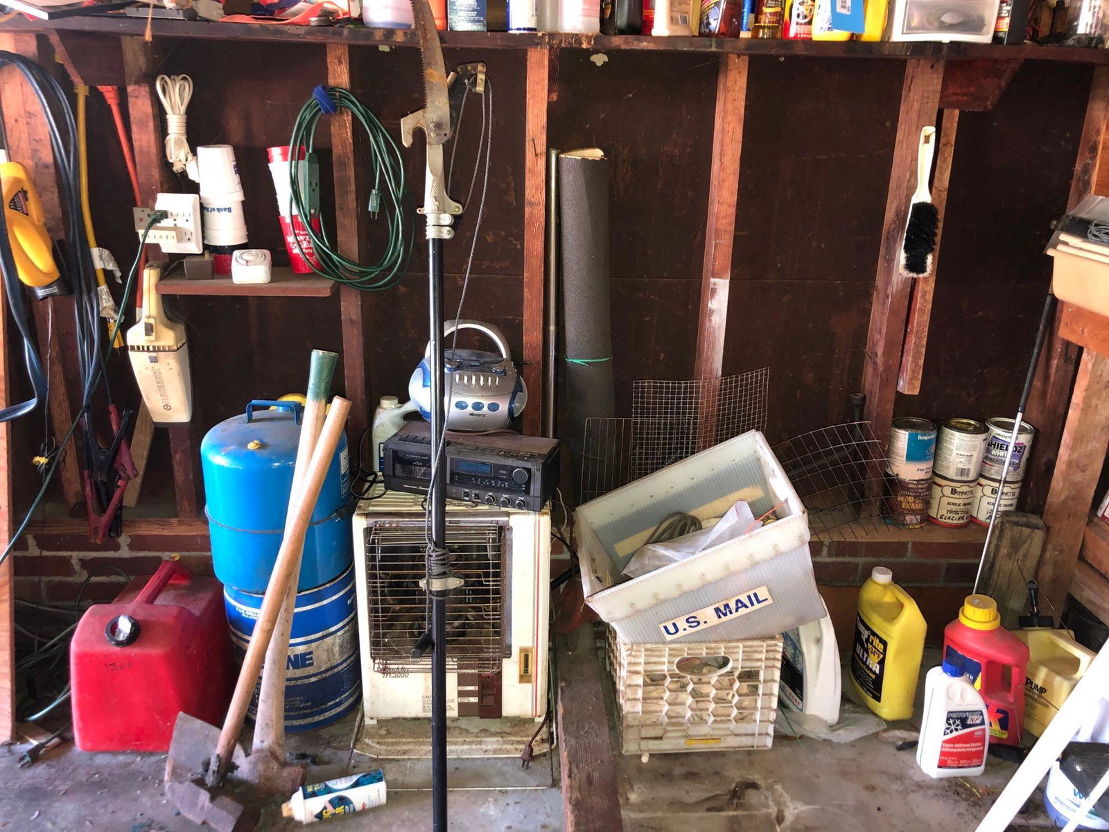 Contents of Wall and Floor: Lot includes contents on the wall and floor in photographs. Items include gas tanks, various tools, screens, stereo equipment and an electric heater. ** Notice: This lot is located, in Hampton, Virgin