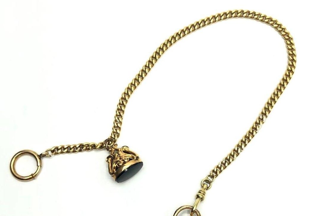Pocket Watch Accessory Chain: Pocket watch accessory chain. Appears to be gold plated but are both unstamped. Chain measures 12 inches long.