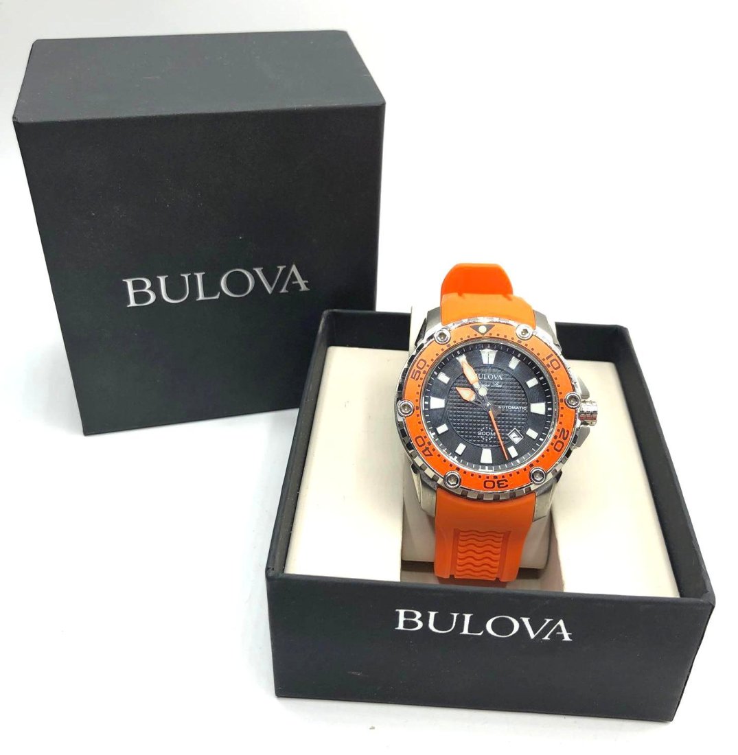 Bulova Marine Star Men's Sports Watch: Bulova marine star wristwatch with silicone band is in working condition and comes in its original box. The face of the watch measures 2 inches wide and 1.75 inches in diameter.