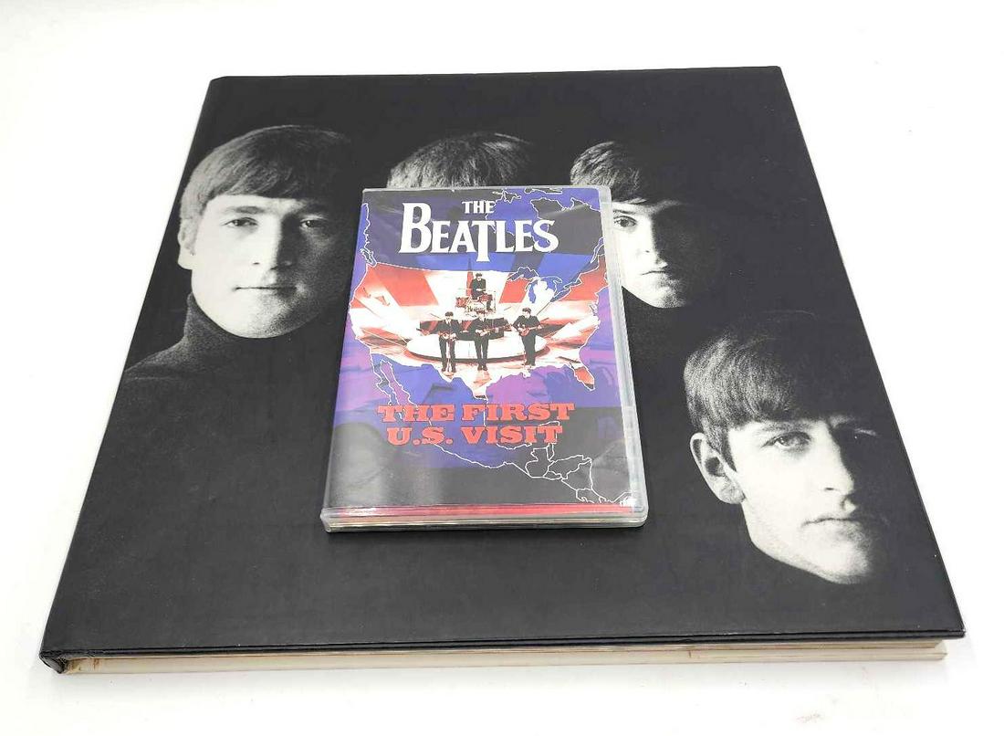 Beatles Collectable Movie and Book: Lot featuring a copy of The Beatles first US visit DVD and The Beatles A Private View book by Robert Freeman. Book measures 13.75 inches tall by 14 3/8 inches wide.