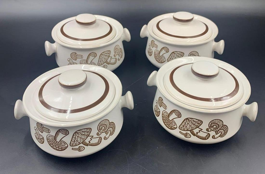 Set of Soup Crocks With Lids: A set of four white and brown French onion soup crocks with a mushroom design. The crocks are made in Japan and each measure approximately 3.75 inches tall with lids on and have a diameter of 4.5 inch